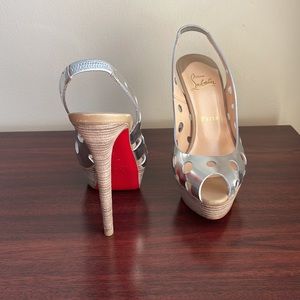 Christian Louboutin Silver Patent
Leather Ginza Platform Sandals
Size 38